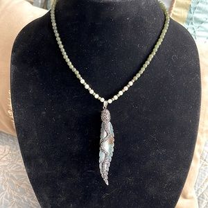 Very unique pendant and strand of semi precious beads long carved abalone leaf